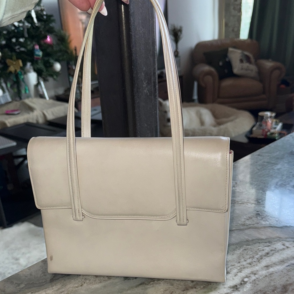 DELVAUX BREVETE cream bag with white and blue stitching on the inside